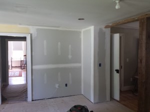 New sheetrock on back wall in Kitchen